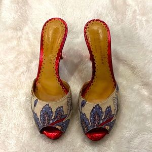 Chic and unique Italian high heels. Floral canvas upper. Metallic red leather.